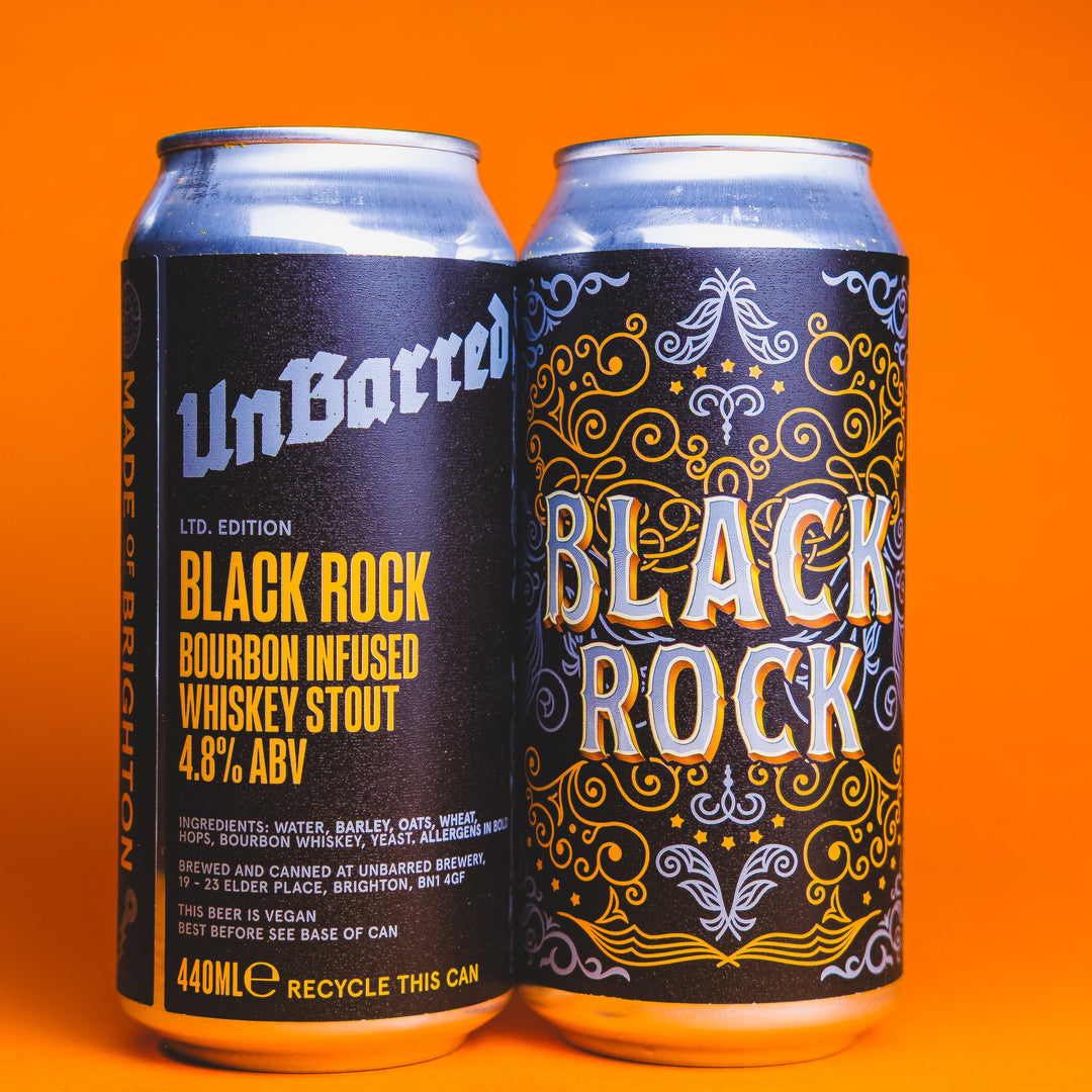 Black Rock stout can beside a glass of dark stout, showcasing a bourbon barrel–aged Irish-style stout with notes of coffee, chocolate, vanilla, and whiskey.